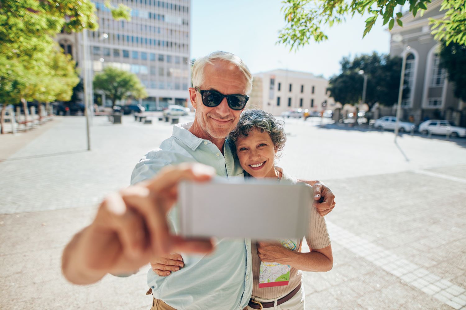 retired couple traveling taking a selfie retirement planning essential component of your financial plan employer sponsored wealth planning kreitler financial 